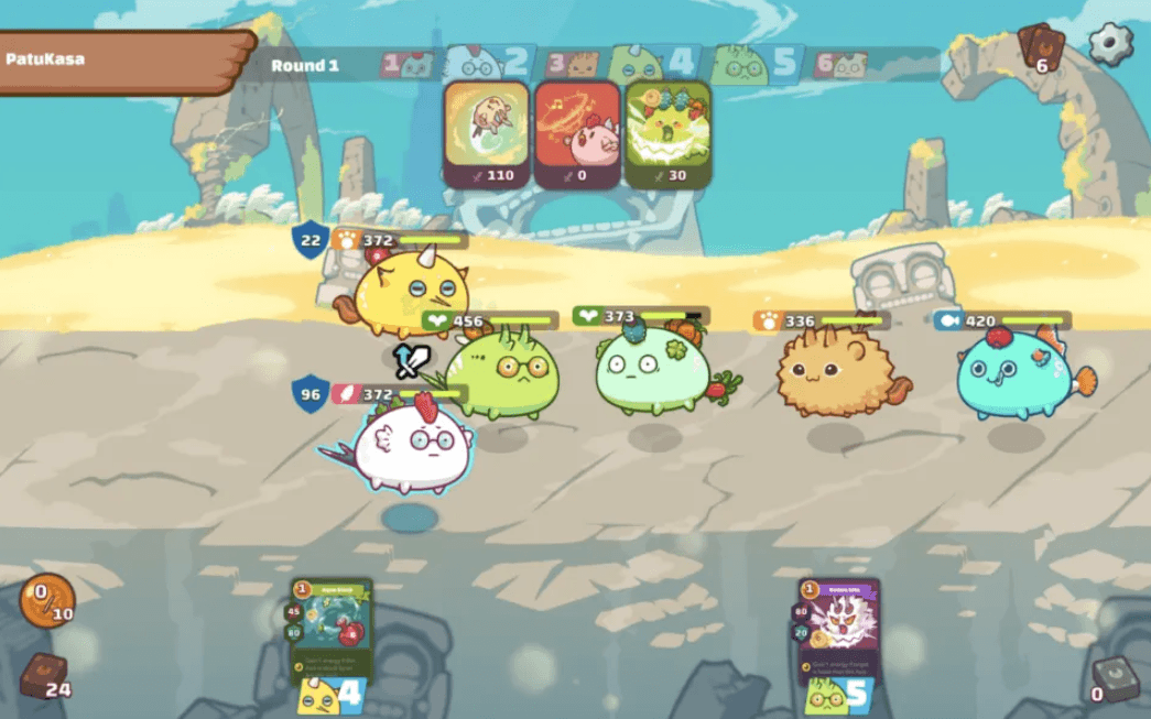 Axie Infinity gameplay: two teams of Axies facing off in a turn-based battle